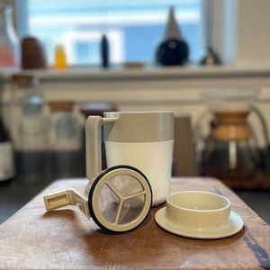 Minimalist unbranded french press to-go mug